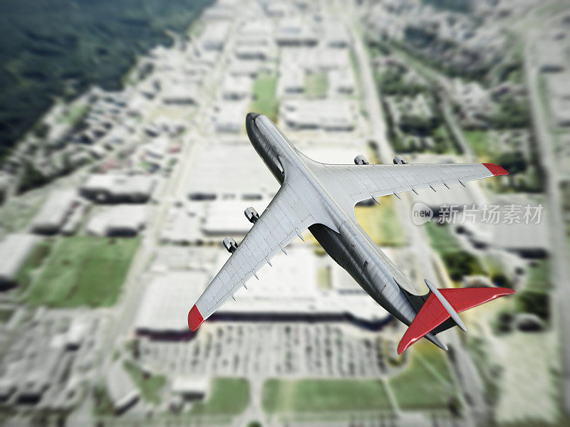 Cargo airplane flying over an industrial zone. Air transportation and logistics concept